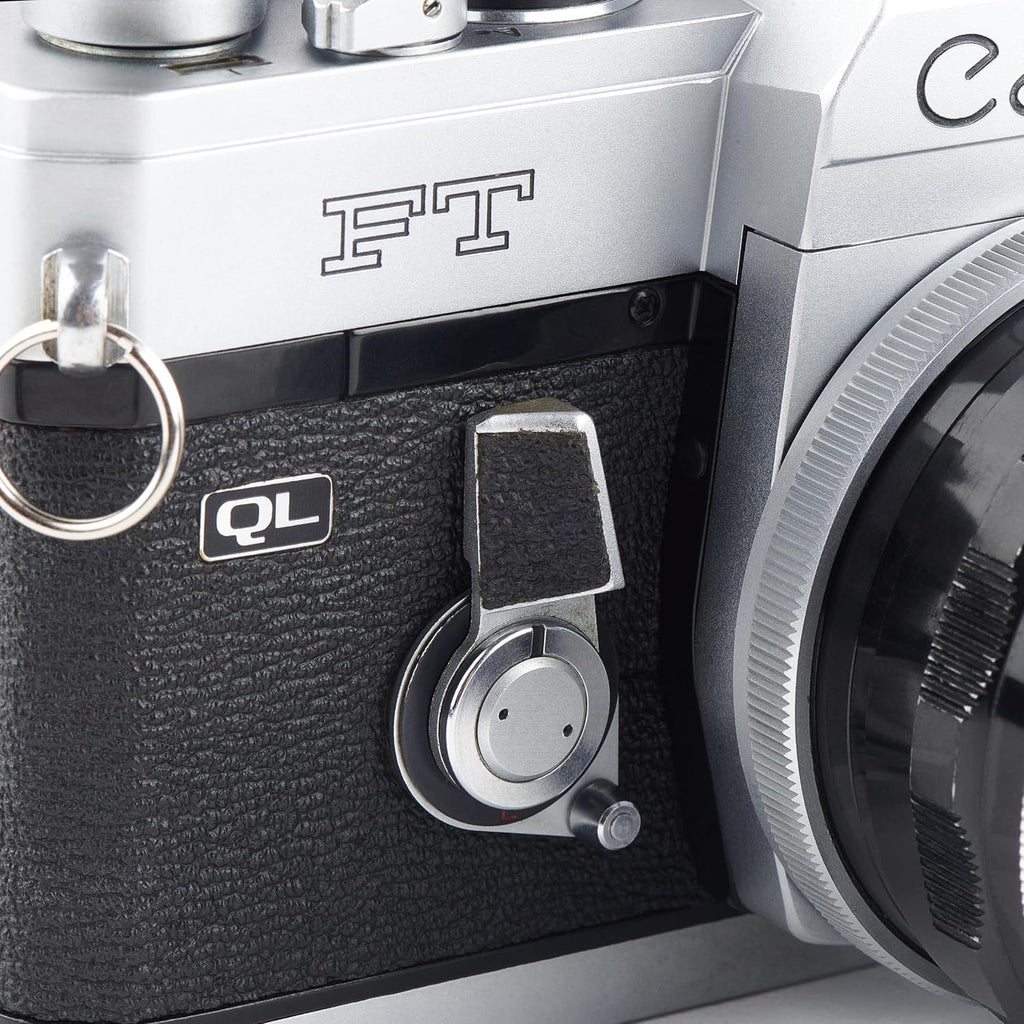 Canon FT-QL 35mm SLR Film Camera with a Canon 50mm FL Lens. (Renewed)