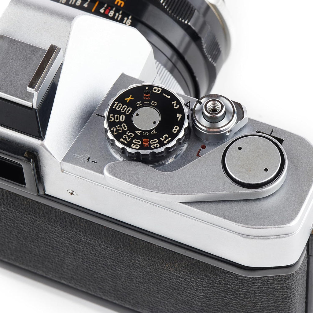 Canon FT-QL 35mm SLR Film Camera with a Canon 50mm FL Lens. (Renewed)